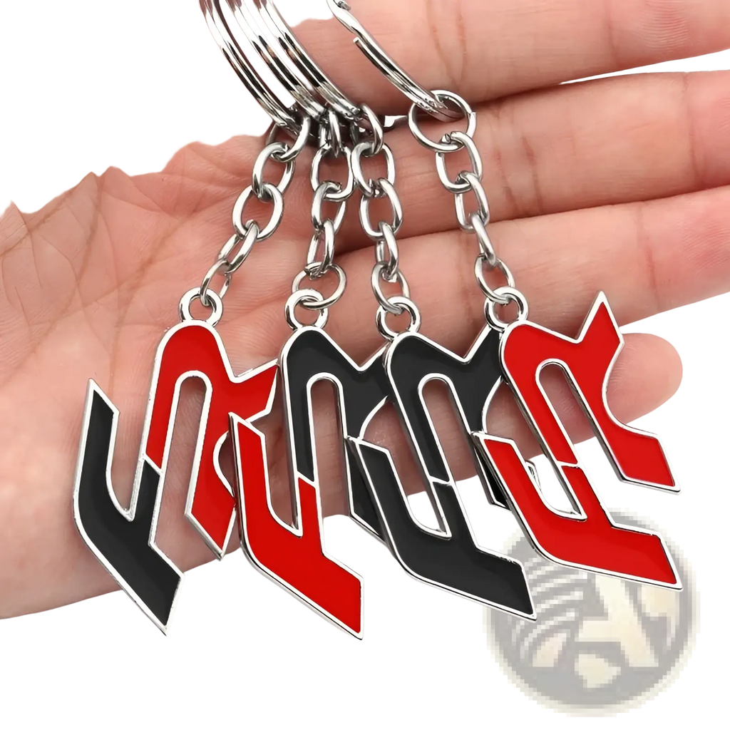 Seat fr metal car keychain and keyring holder in red and black enamel-coated metal with stylized v logo design