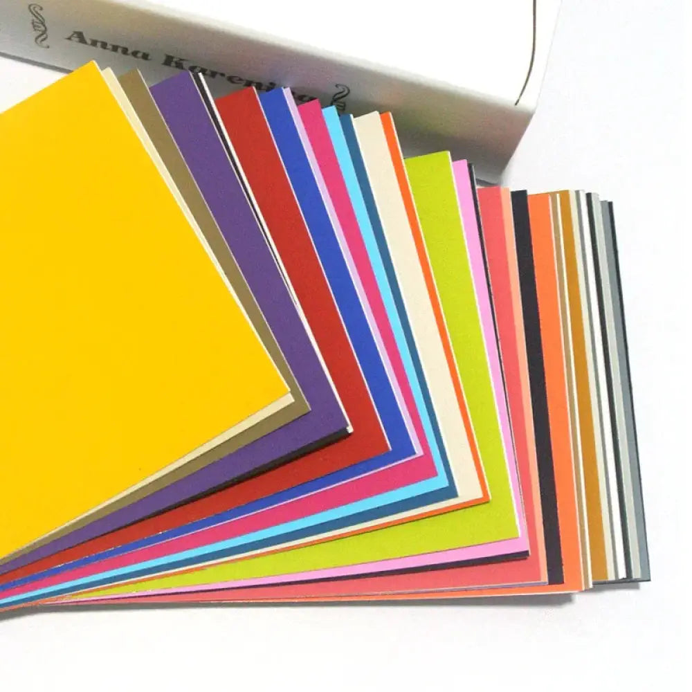 A vibrant array of anna karenina brand colored paper sheets in assorted hues for self-adhesive navy blue leather sofa repair patch