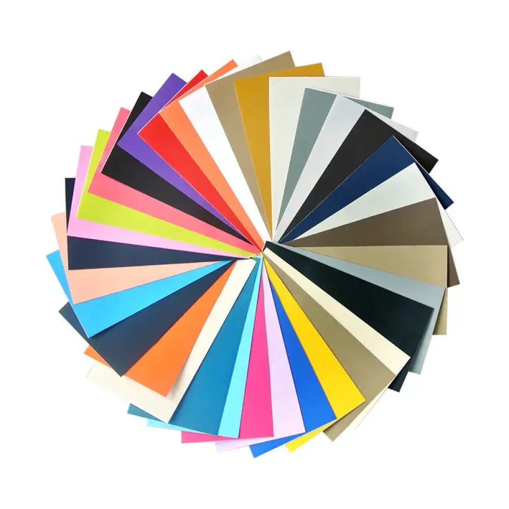 A vibrant circular fan of colorful matte and metallic paint swatches showcasing shades for self-adhesive navy blue leather sofa repair patch