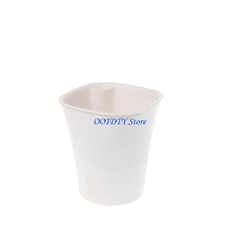 White disposable paper cup with flared rim used as a self watering flower pot plastic nursery planter