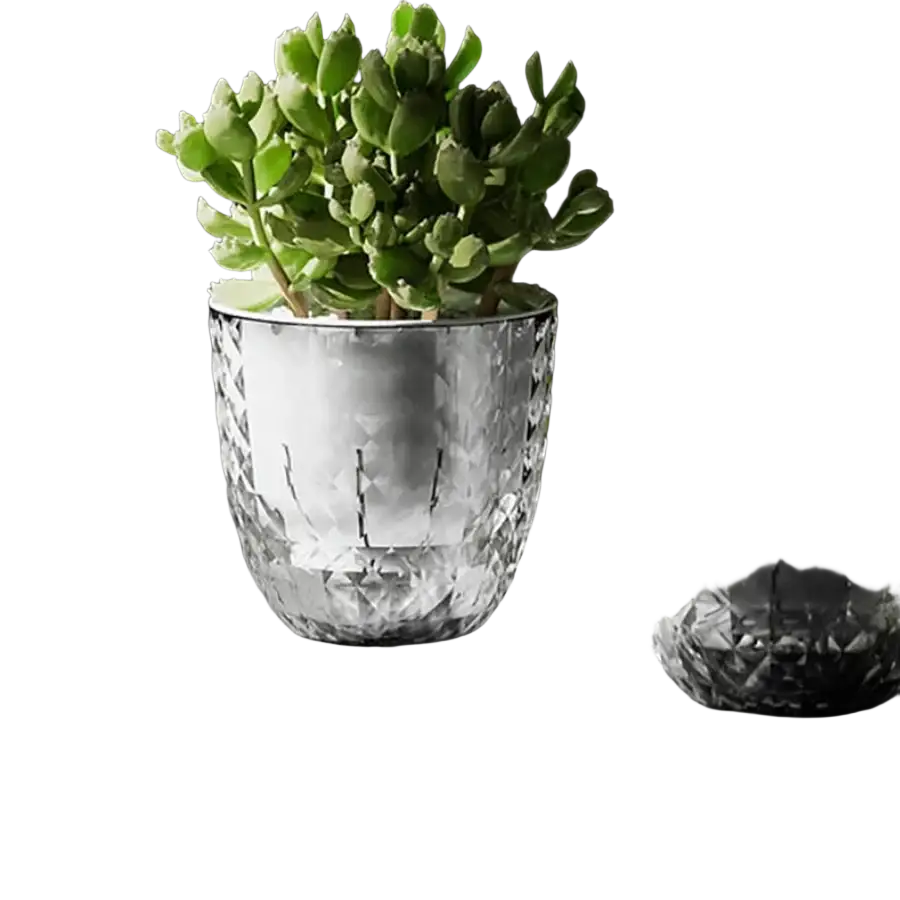 Clear faceted crystal double layer planter with geometric cut pattern and self-watering feature for flowers