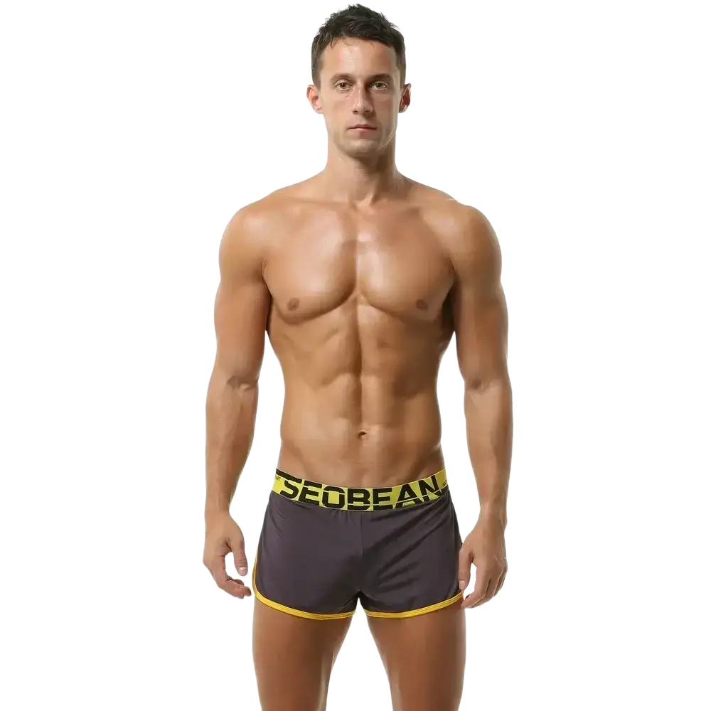 Dark gray seobean men’s silky lounge shorts boxer with bold yellow trim and branded elastic waistband in black lettering