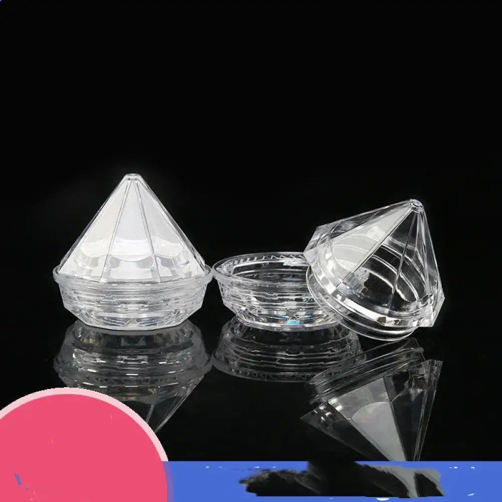 Diamond faceted refillable travel cosmetic bottle set with clear faceted plastic containers and glossy intricate cut patterns