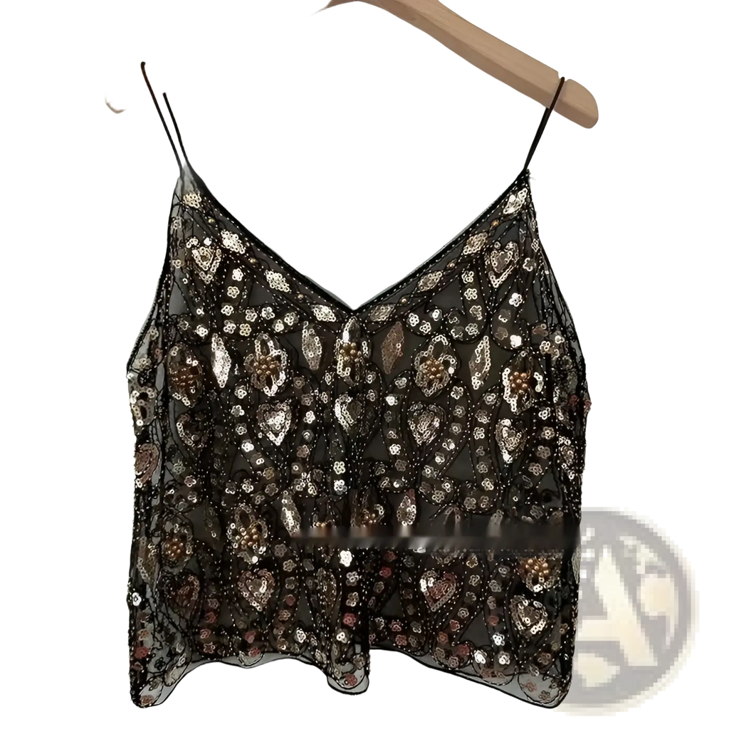 A black sheer mesh camisole top embroidered with silver and rose gold sequin and bead patterns
