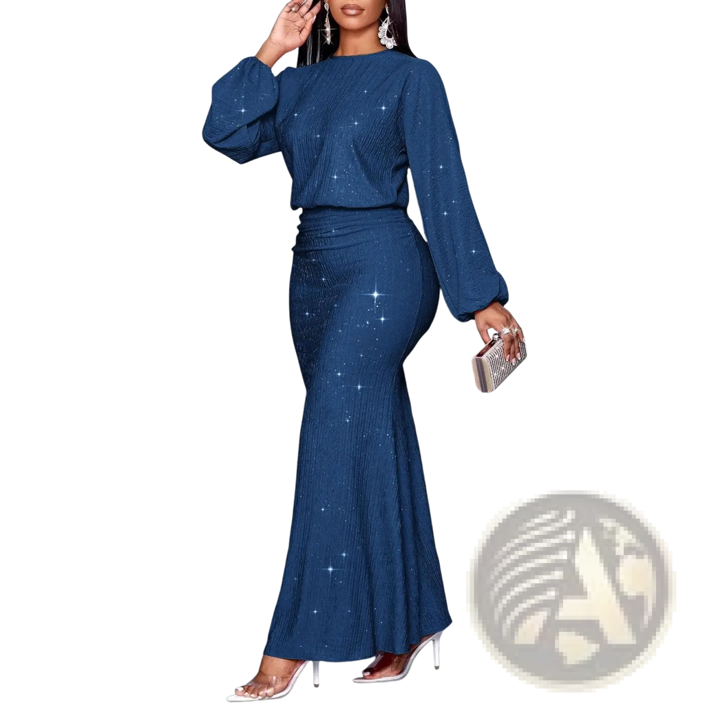 A navy blue starry sequin two-piece set with fitted long sleeve top and flared mermaid skirt