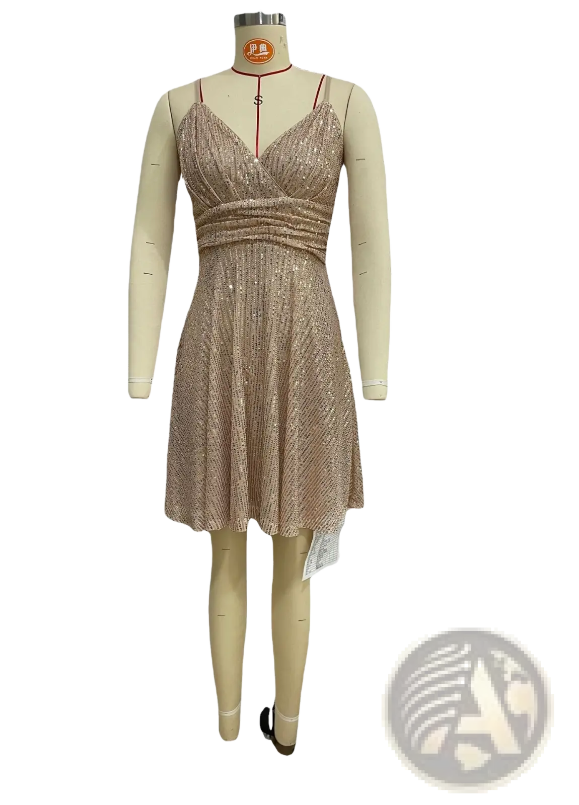 A shimmering gold sequined cross strap vacation dress with v neckline and ruched waist displayed on a mannequin