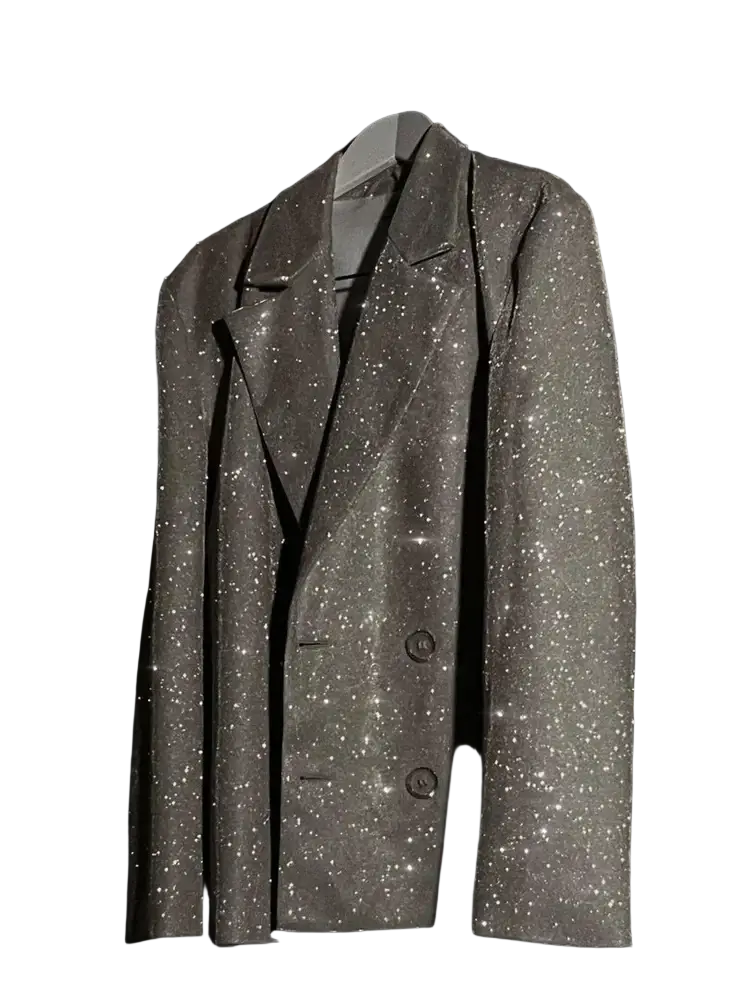 Sequined oversized blazer for women in shimmering silver with sparkling glitter and classic double-breasted black buttons