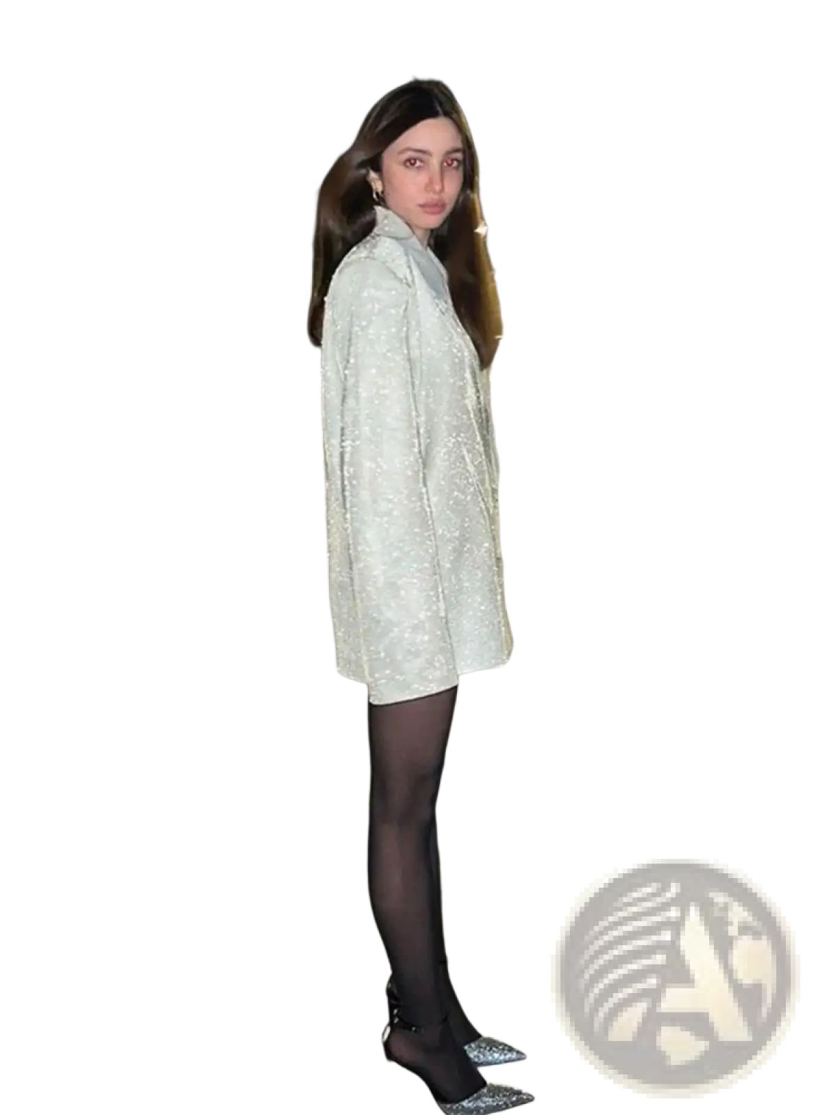 Sequined oversized blazer for women in shimmering silver with structured collar worn over black tights and sparkling heels