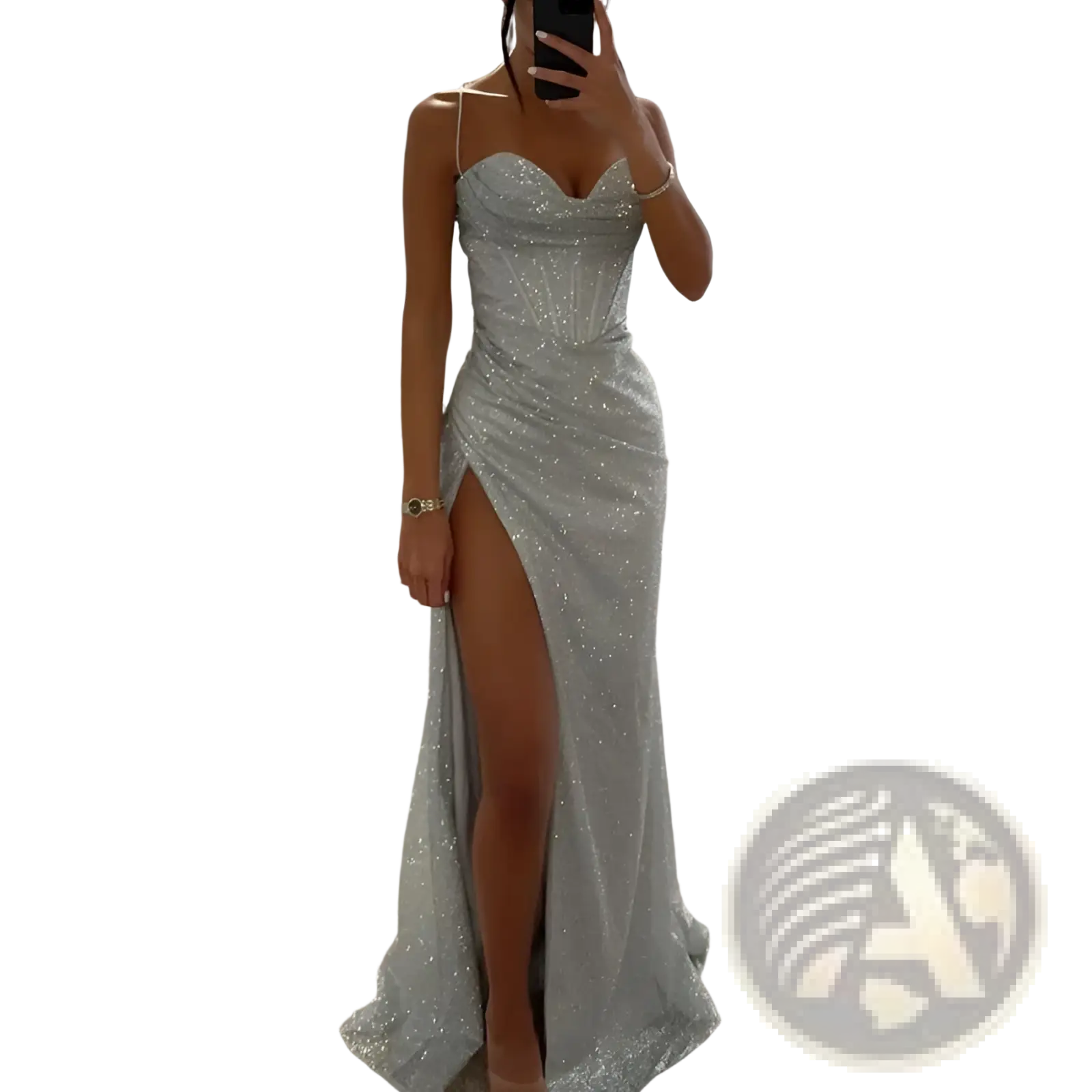 A shimmering silver sequined evening gown with a fitted bodice, sweetheart neckline, and high slit