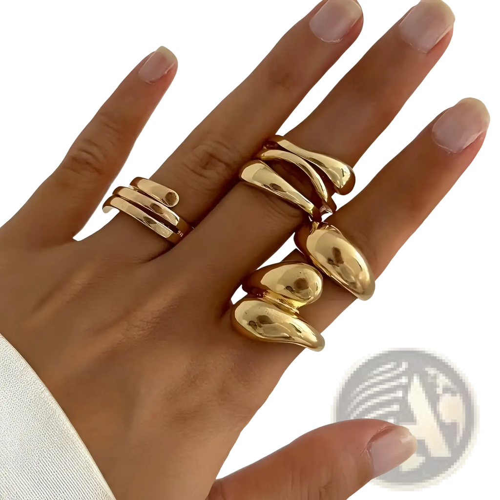Set of 4 elegant adjustable golden geometric rings with gold-toned sculptural smooth flowing curves and polished finish