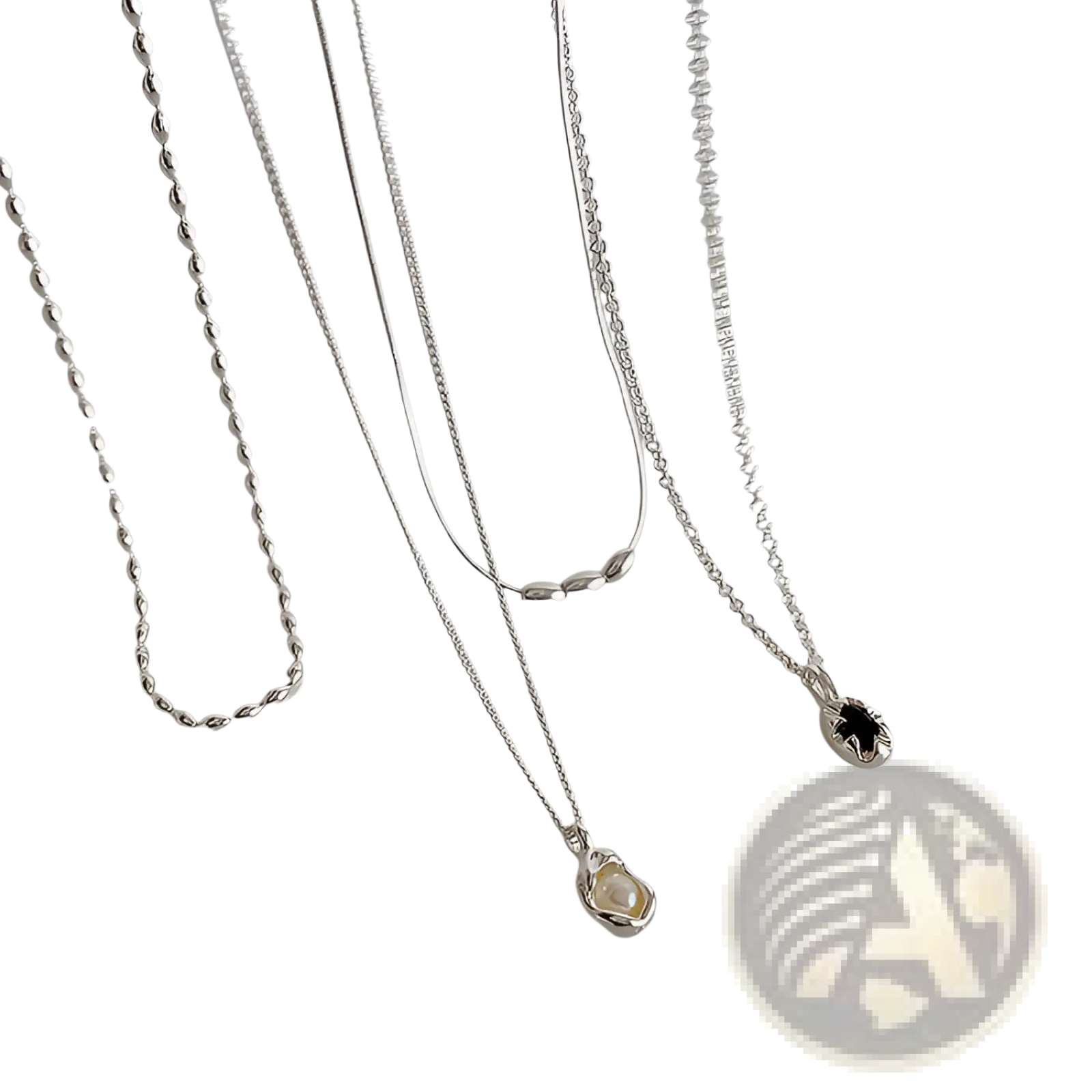 Set of five minimalist silver necklaces with unique chains and pendants featuring pearl and black gemstone designs