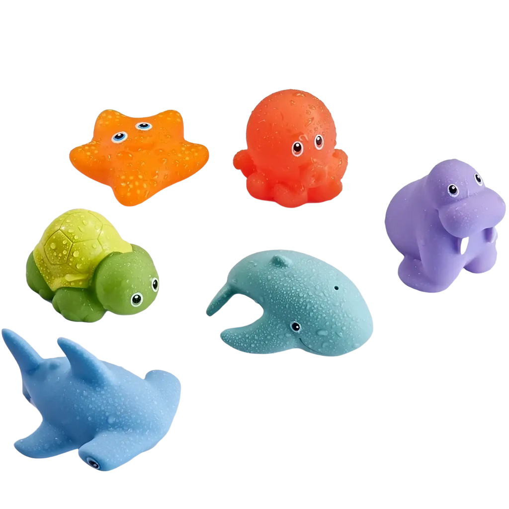 Bright orange rubber octopus bath toy with googly eyes and textured suction cup feet from shark bath toy fishing game set