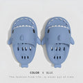 Light blue shark-shaped quick dry non slip shower slippers with black eye details and a playful cartoonish design