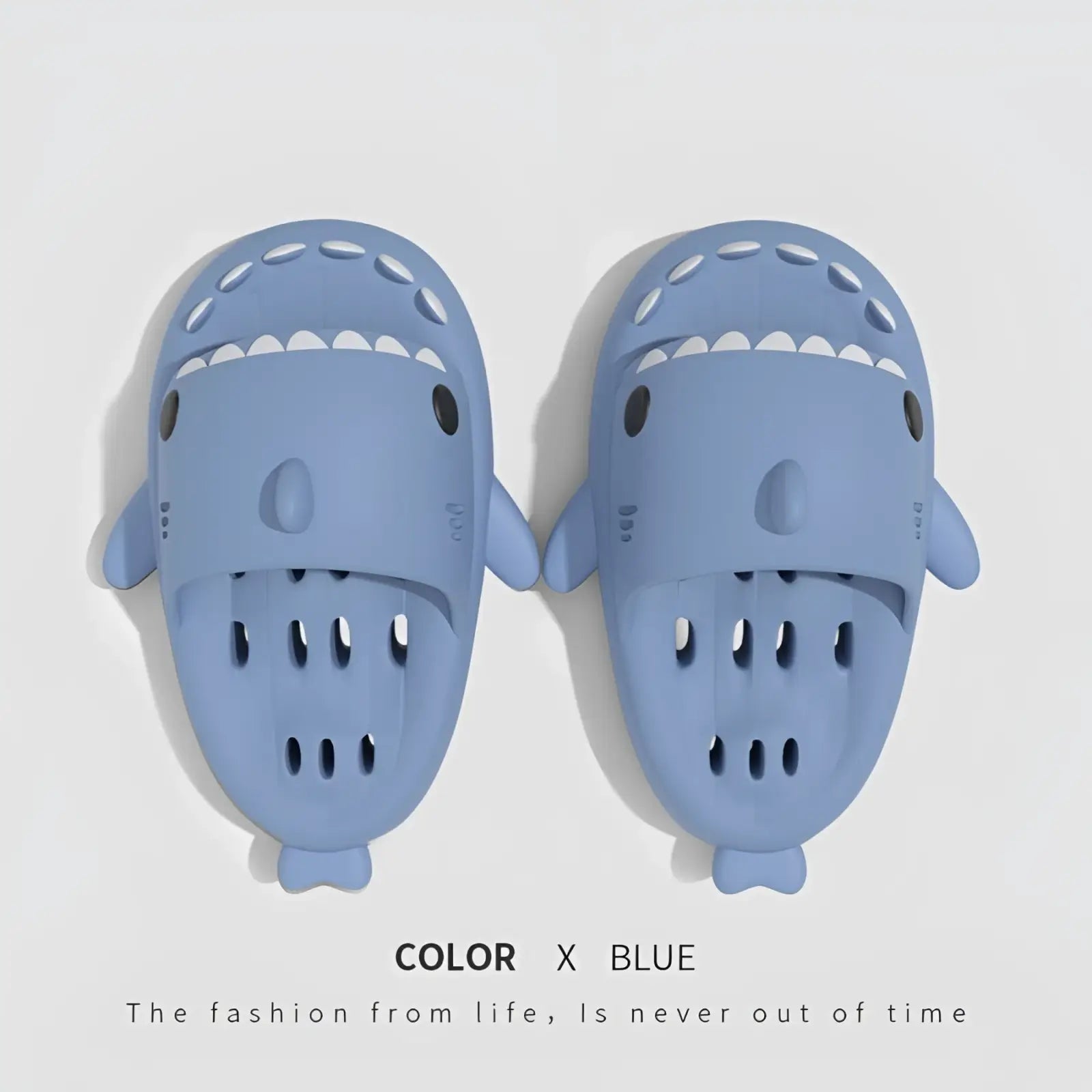 Light blue shark-shaped quick dry non slip shower slippers with black eye details and a playful cartoonish design