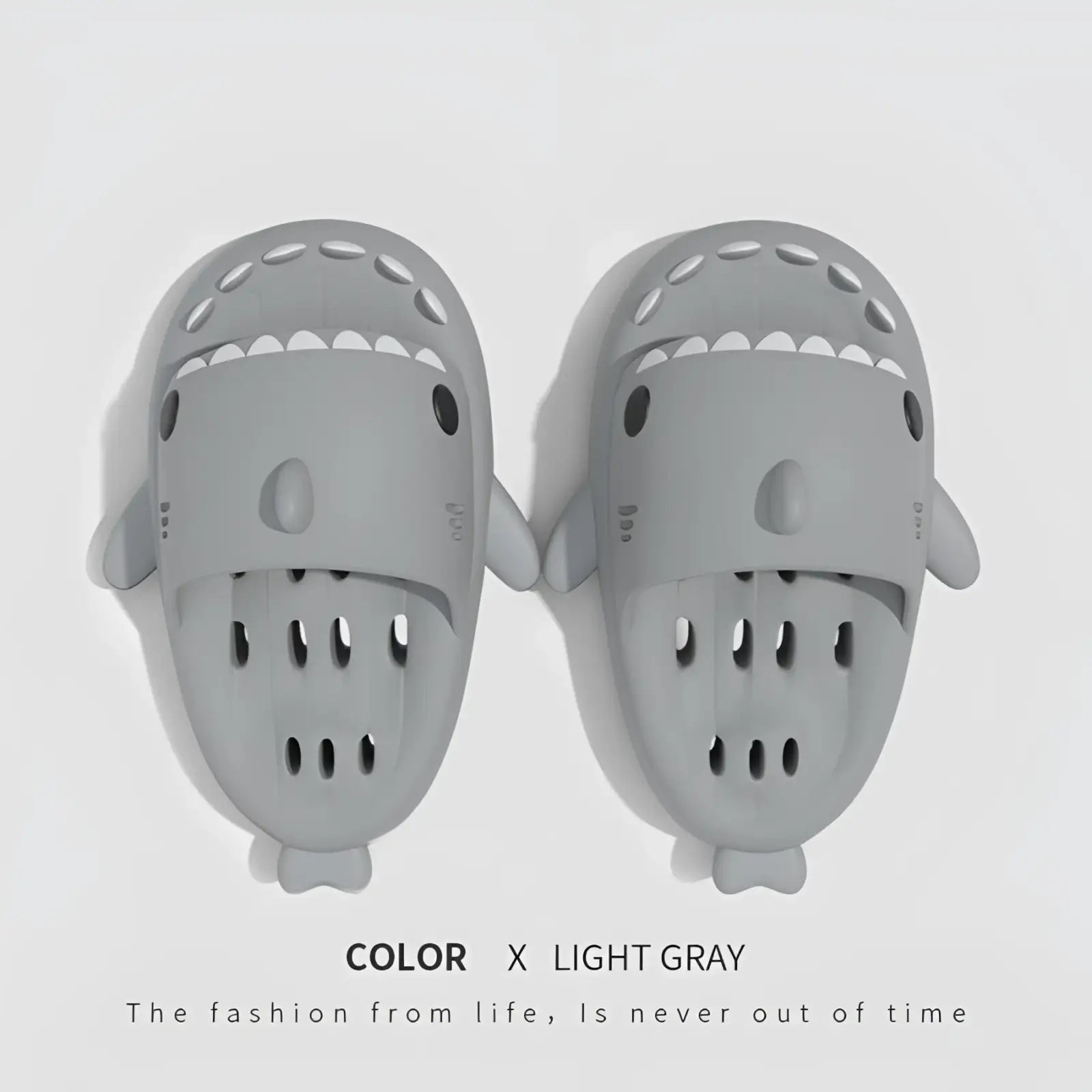 Light gray shark-shaped quick dry non slip shower slide sandals with molded fins and eye details