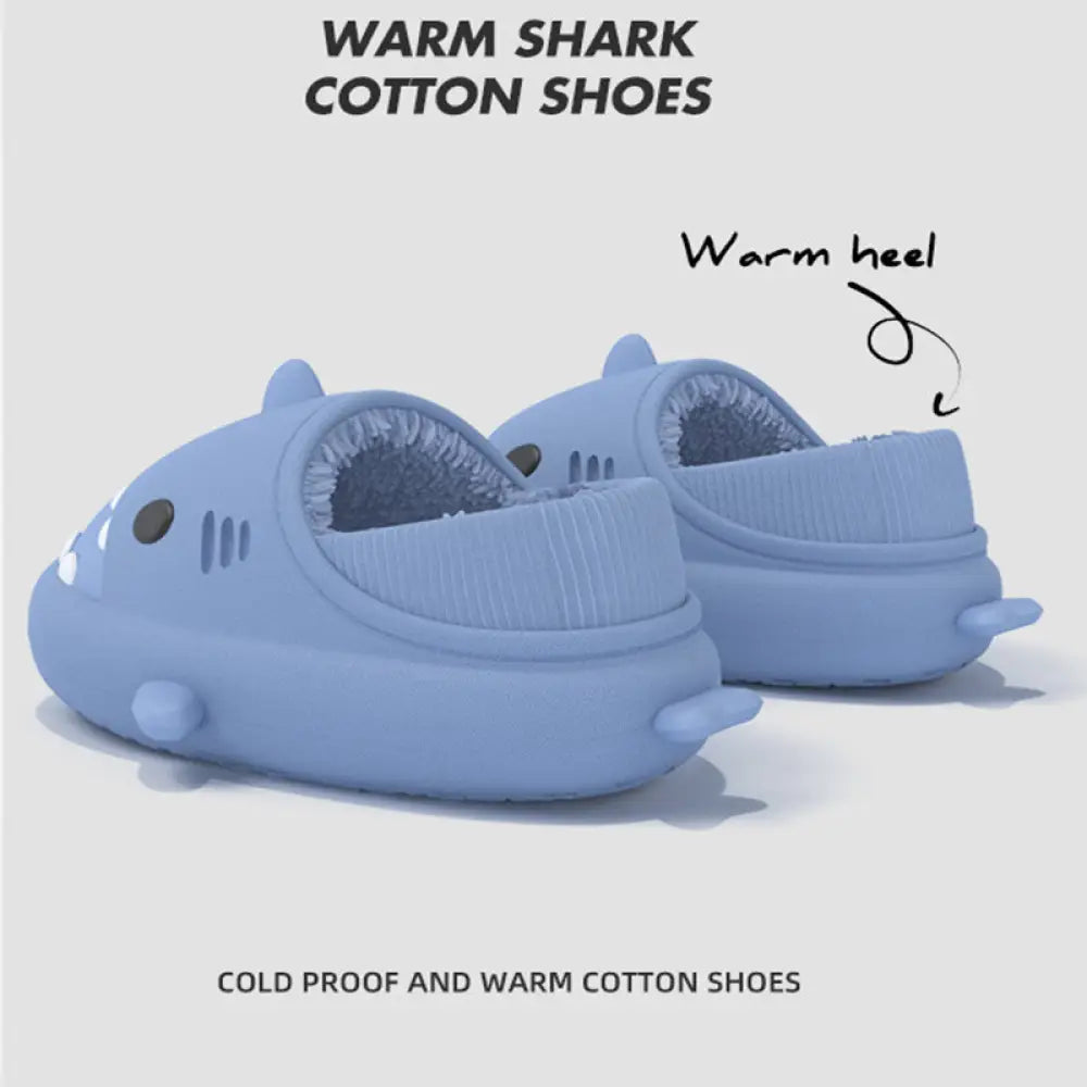 Light blue shark-shaped cotton slippers with plush warm interior and soft rubber soles for winter indoor use