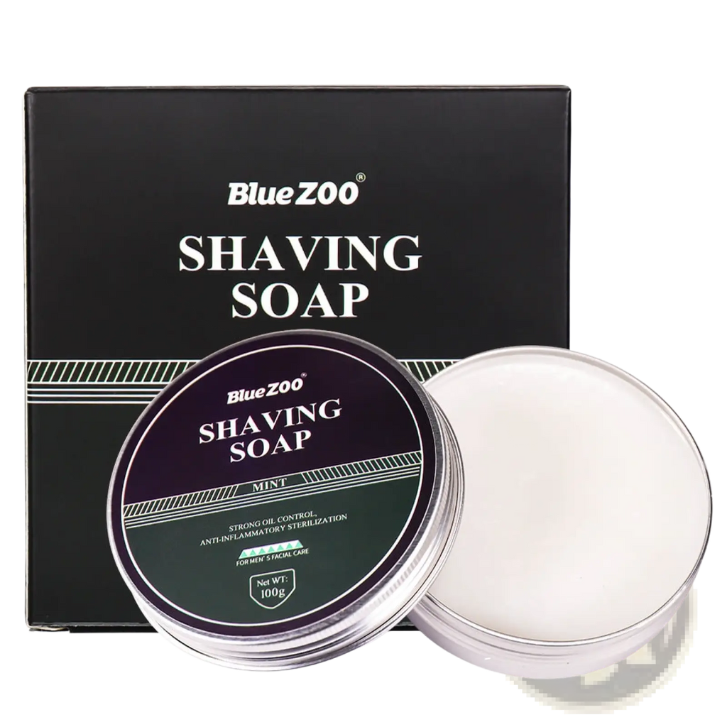 Bluezoo mint-scented shaving soap in a silver tin with black and green label beside its matching box for men’s moisturizing sandalwood cream