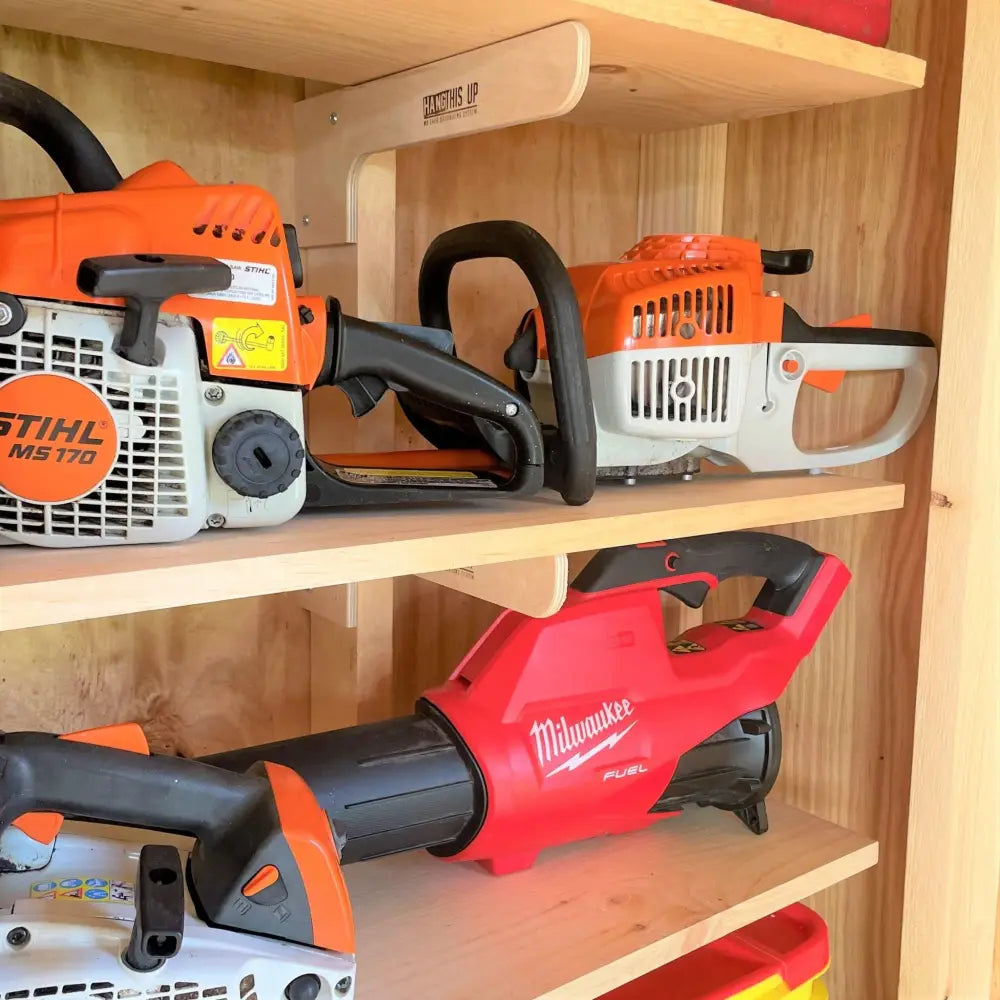 Orange and white Stihl MS 170 chainsaw with black handle shown alongside heavy duty stud mount steel shed shelf brackets kit