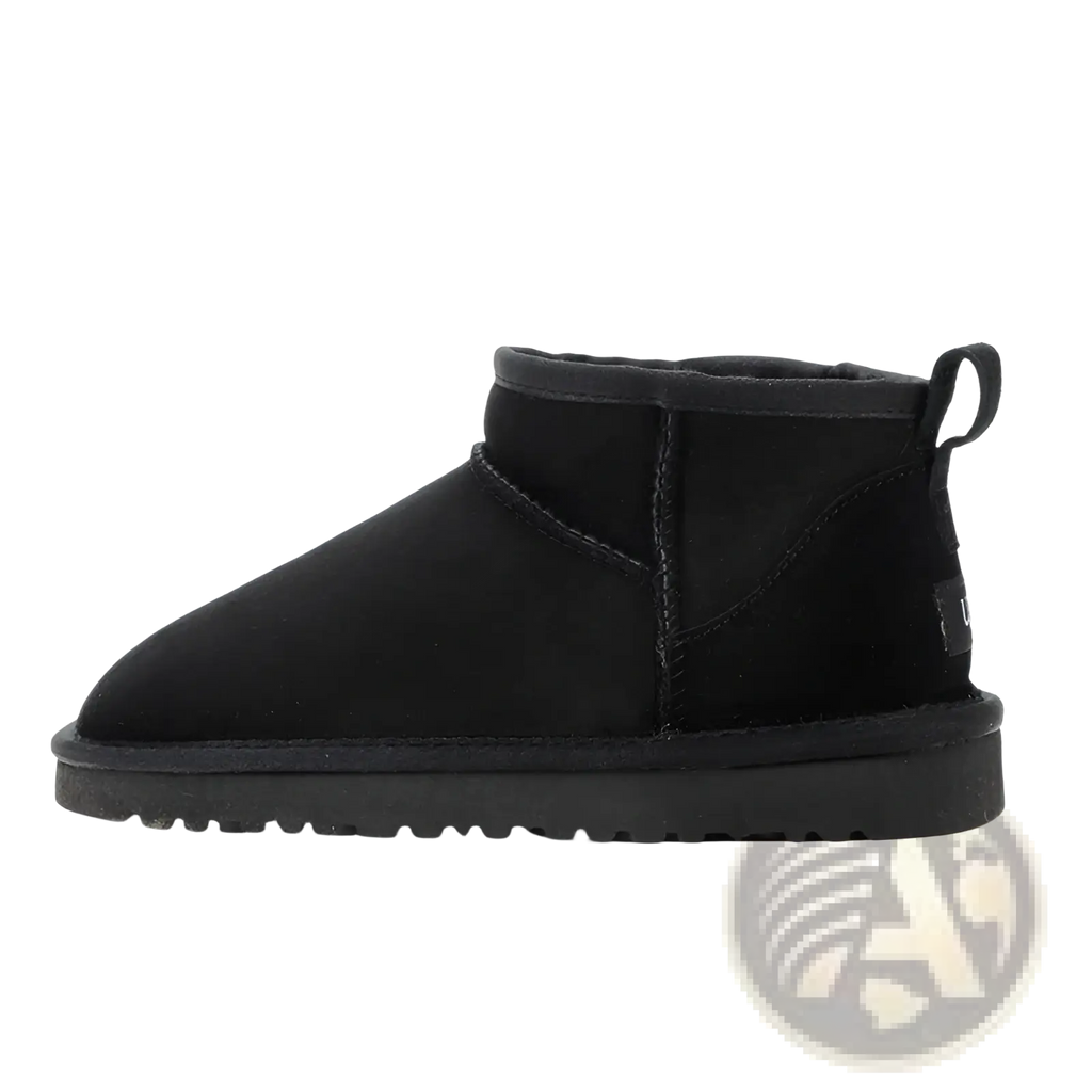 Black suede sheepskin mini snow boot with plush interior and rubber sole for warmth and comfort