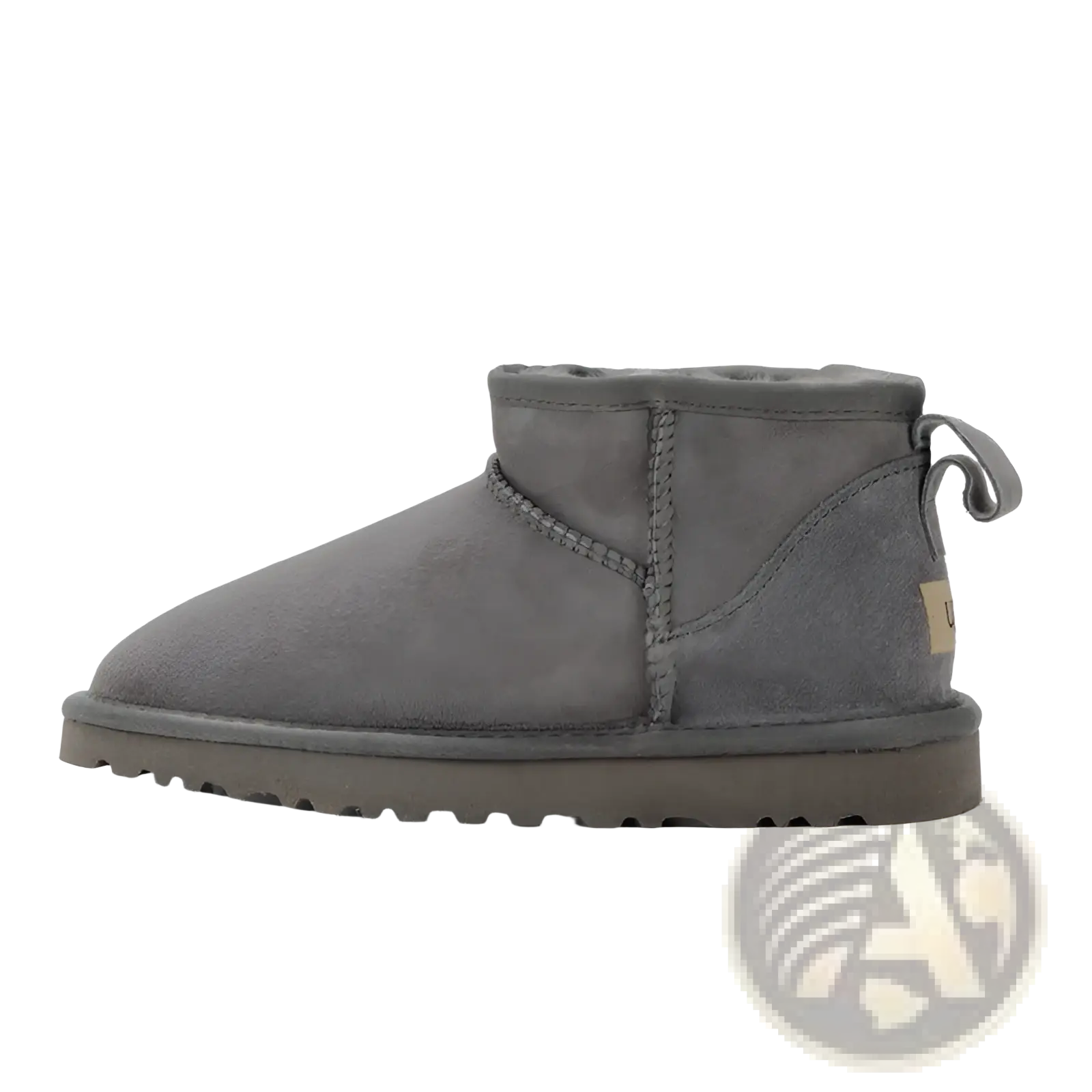 Gray suede sheepskin mini snow boot with plush interior and sturdy rubber sole for cold weather use