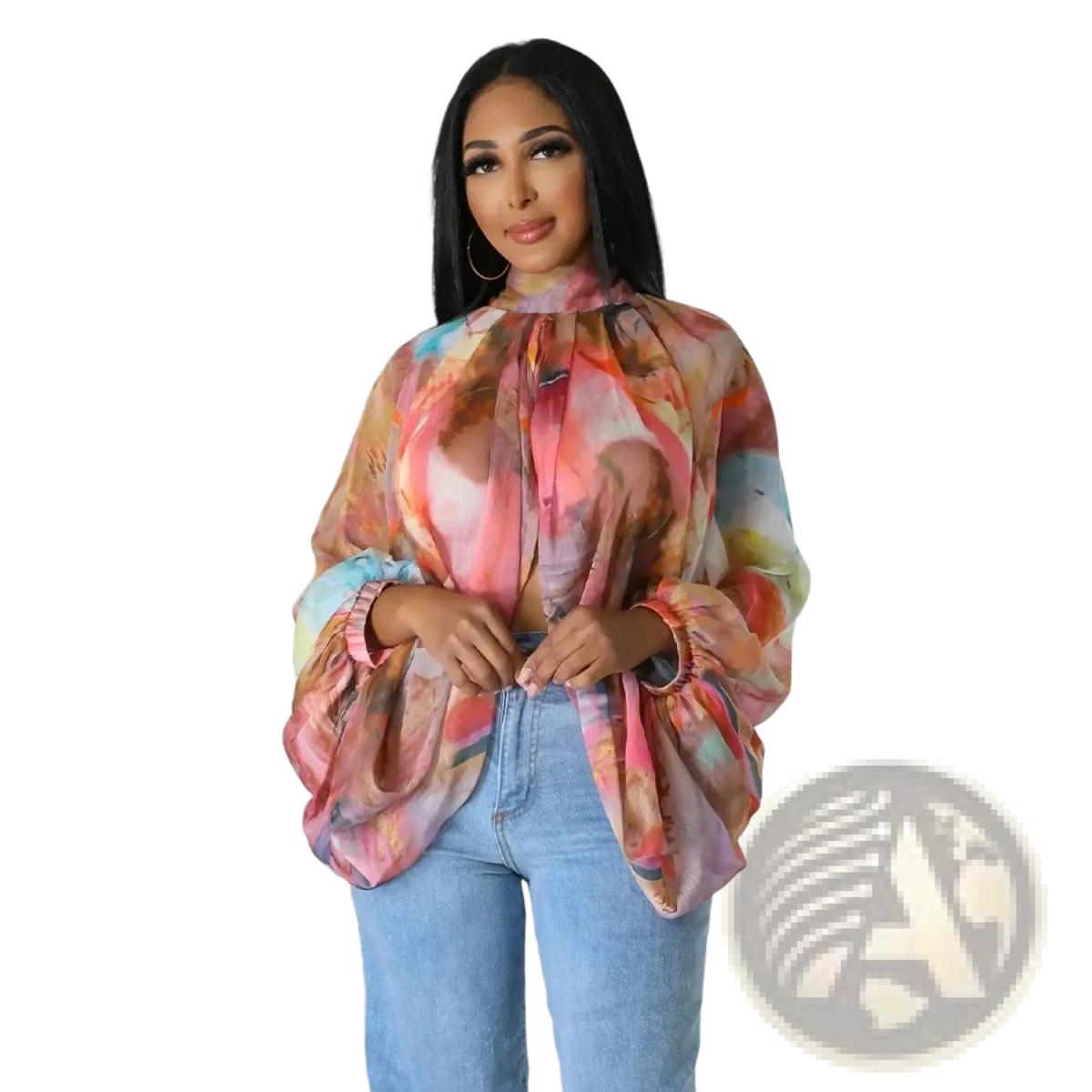 A woman wears a sheer chiffon blouse with an abstract print and tie neck in soft pinks, oranges, blues, and purples