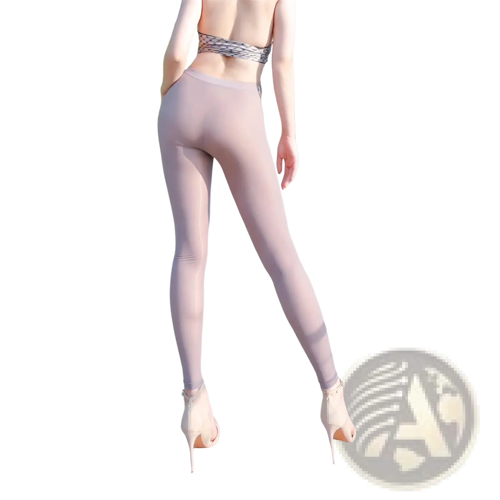 A pair of sheer high waisted nude leggings made of smooth stretchy fabric for casual wear