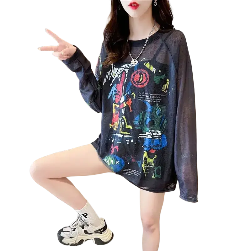 Black sheer long sleeve top with vibrant graffiti-style graphic print and lightweight transparent material