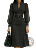Black denim midi dress with sheer long sleeves and a black belt showcasing colorblock design