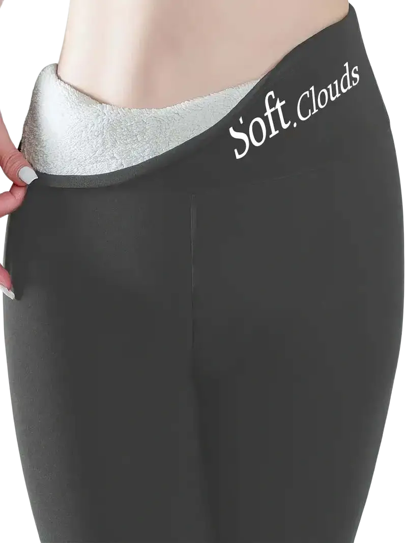 Black sherpa lined fleece thermal winter leggings with plush silver inner lining and soft.clouds branding on waistband