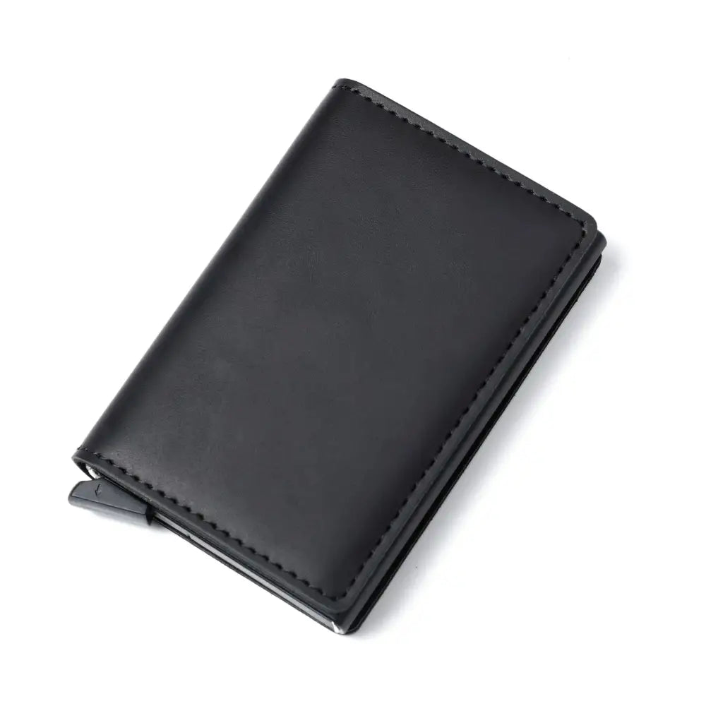 Black leather slim RFID blocking card case wallet with sleek minimalist design and precise edge stitching