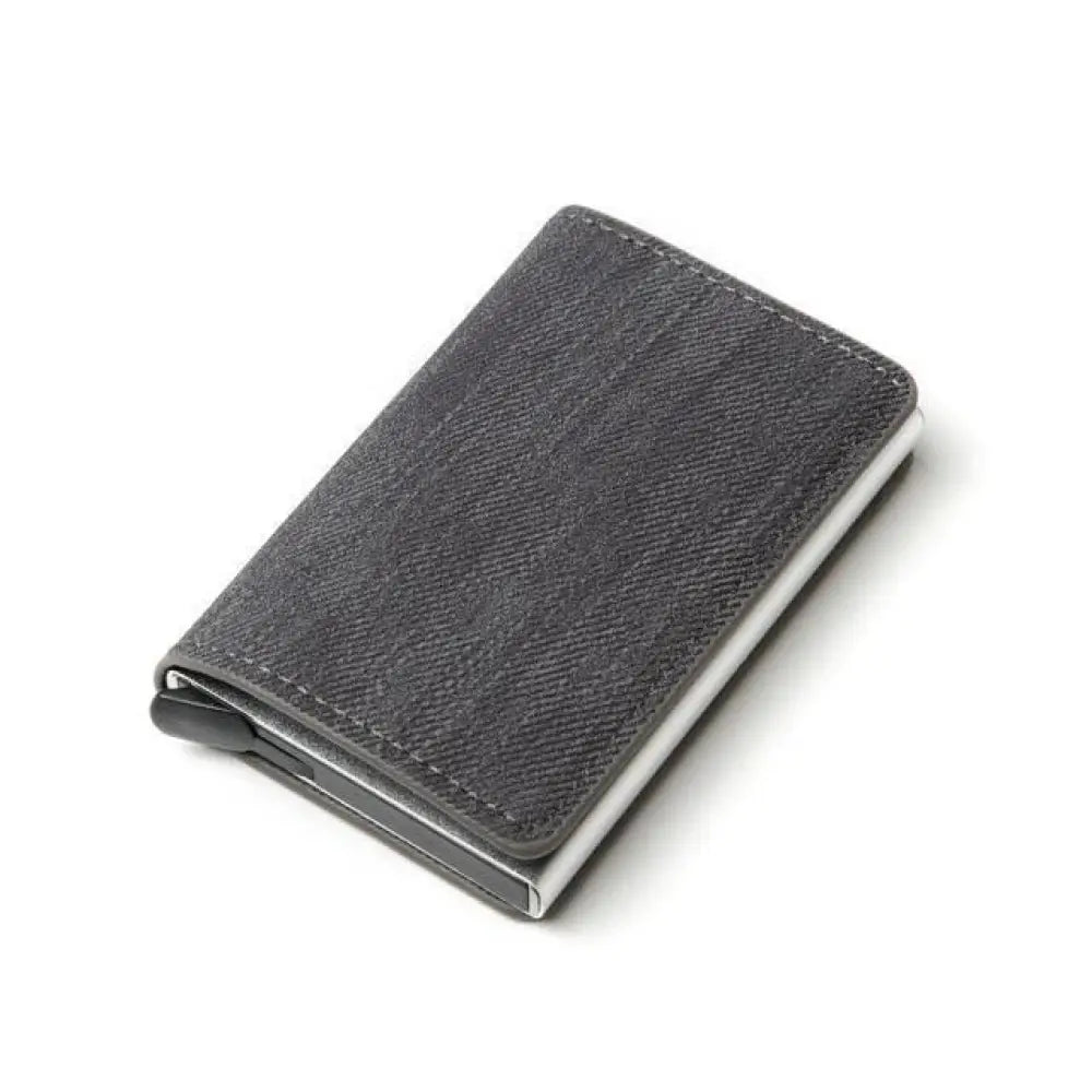Slim RFID blocking aluminum alloy card case wallet in dark gray denim texture with metallic silver edge and black clasp