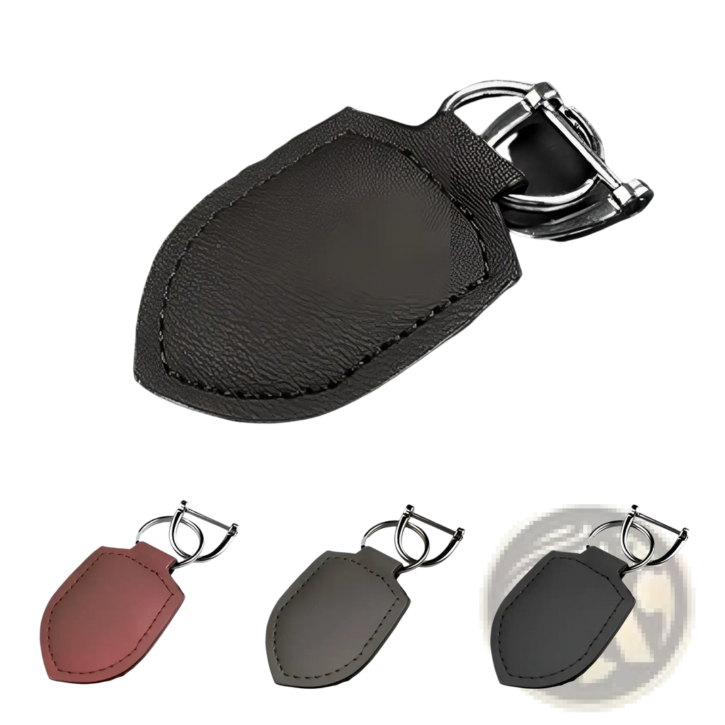 Dark brown leather shield-shaped car keychain ring organizer with silver metal ring and clasp