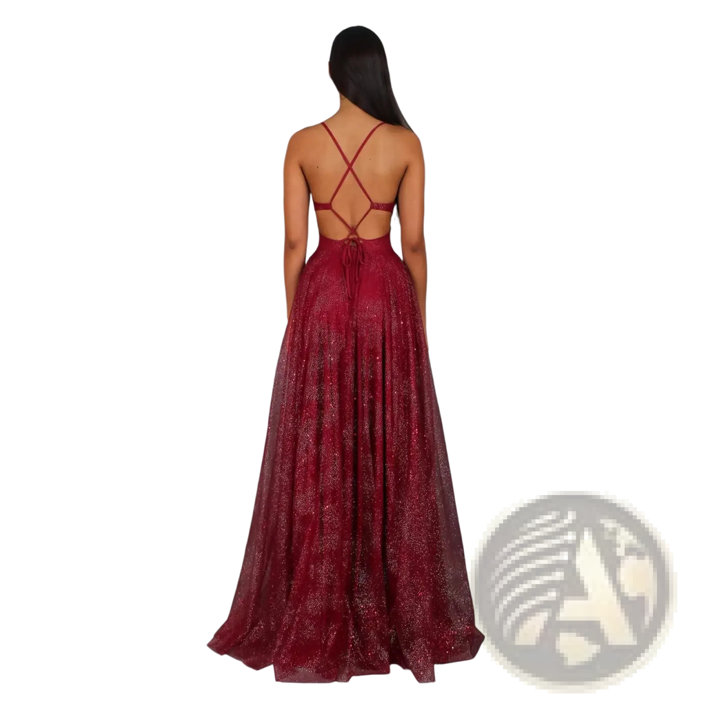 Back view of a shimmering burgundy lace v neck high slit maxi evening gown with crisscross straps and a glittery skirt