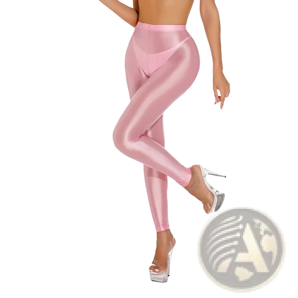 Pink shiny metallic high waisted disco leggings featuring sheer fabric and a sleek, reflective finish