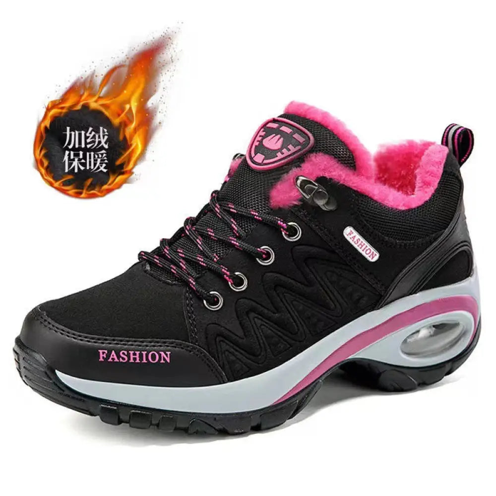 Women’s purple and black winter hiking shoe with plush lining air cushioning sole and fashion branding