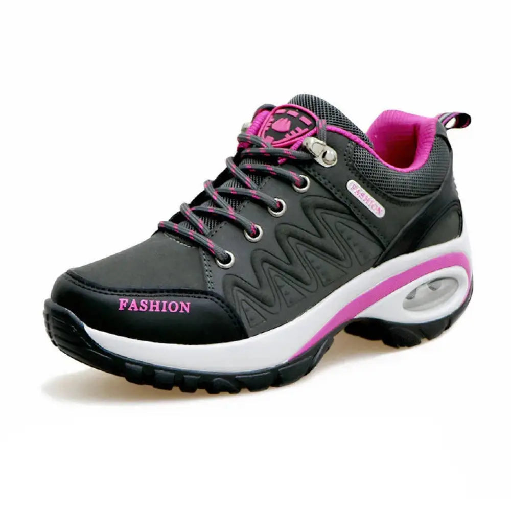Women’s purple and black air cushion athletic hiking shoes with mesh upper white midsole and visible air cushioning unit