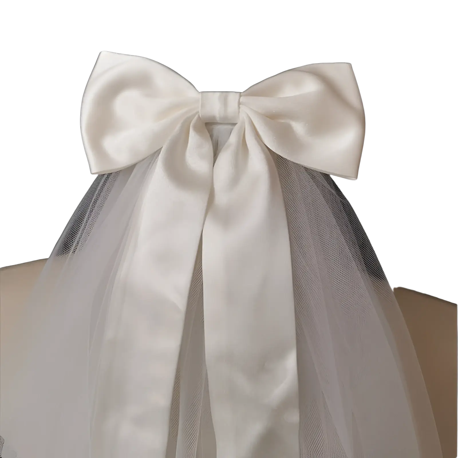 Short bridal veil with a delicate white satin bow and sheer tulle attached to a silver hair comb accessory