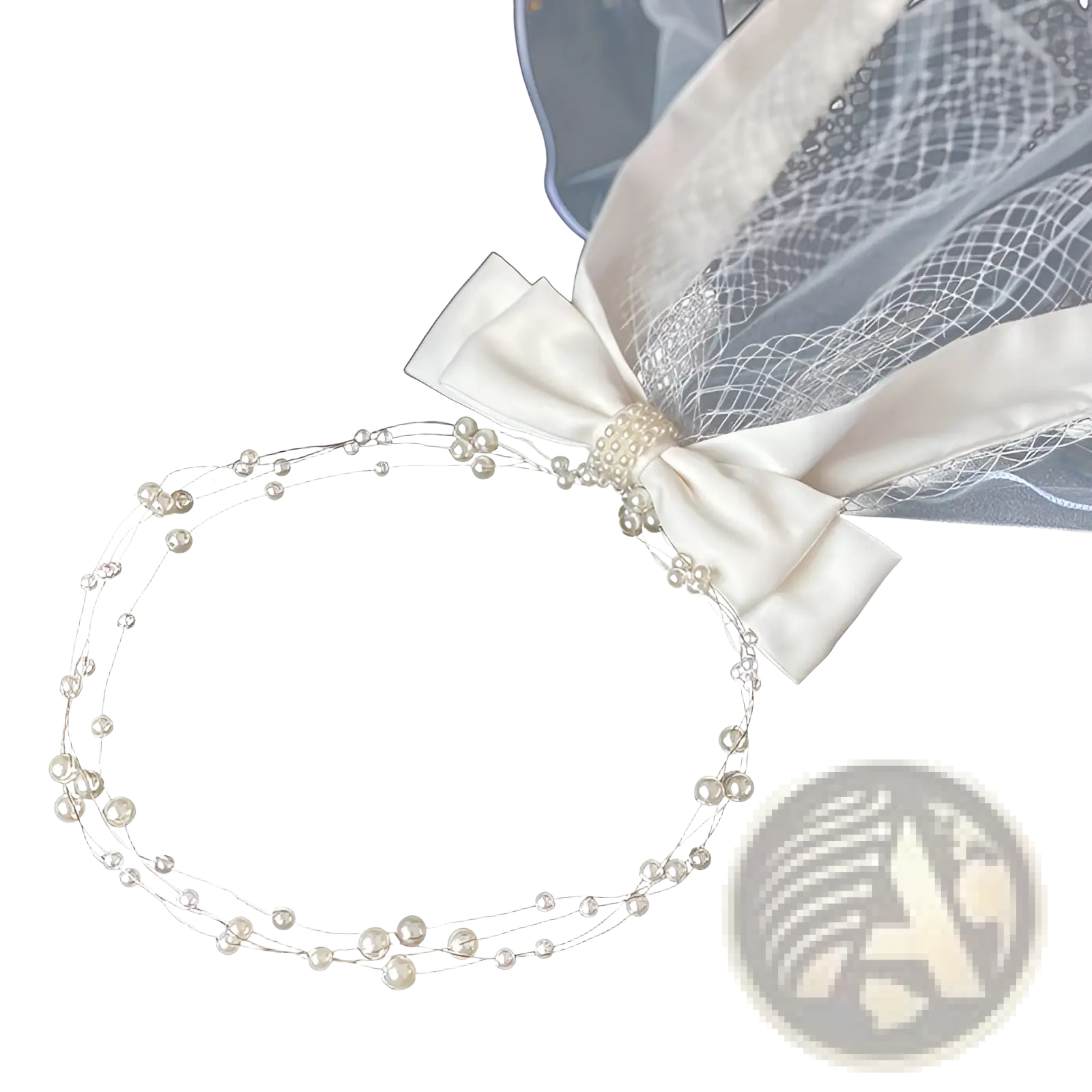 Short bridal veil featuring an ivory satin bow and silver hair comb with delicate pearl and wire details