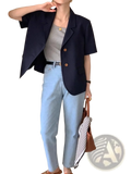 Navy blue short sleeve blazer for women with gold buttons and notched lapels in a relaxed fit casual jacket design