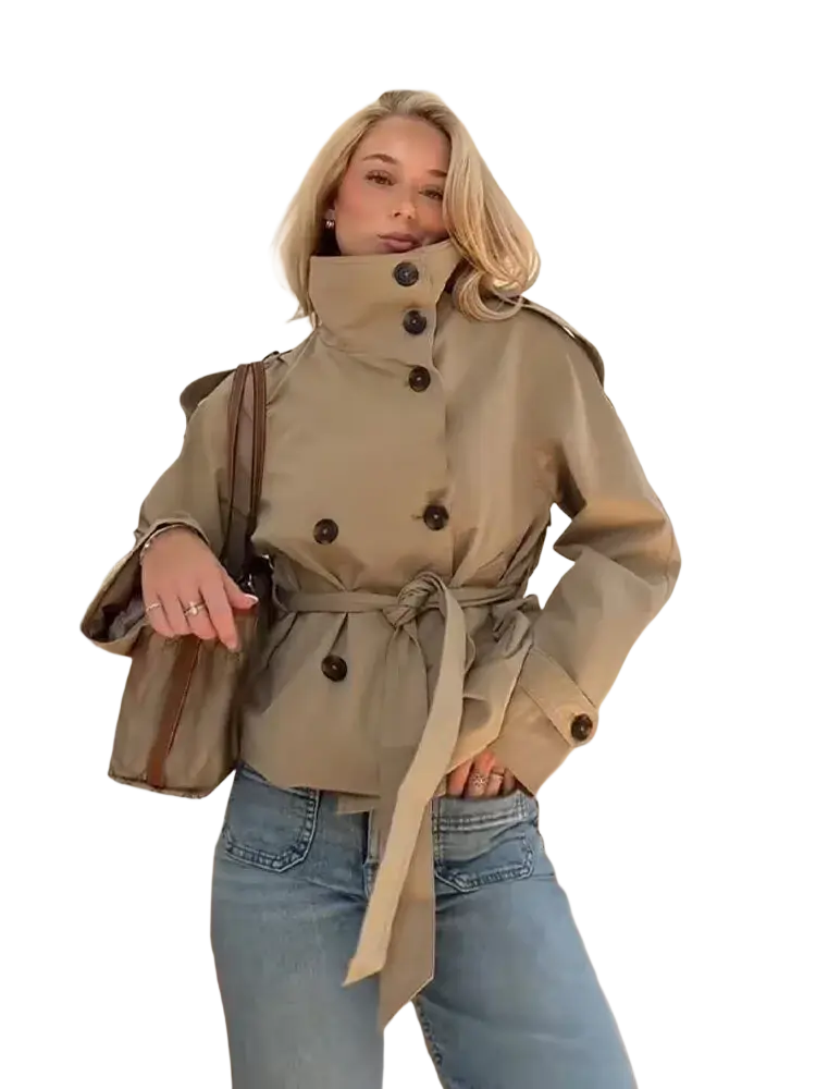 Beige short trench coat for women with dark brown buttons and matching belt in double breasted streetwear style