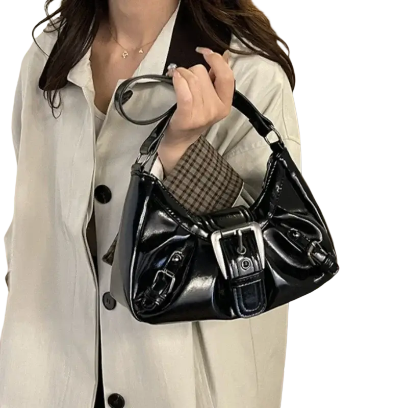 Black patent leather shoulder bag with silver-toned buckle and strap details for women brown patent leather saddle bag
