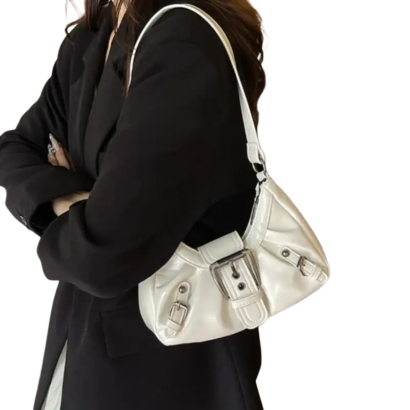 White patent leather shoulder bag with silver buckle closures and a structured curved silhouette for women