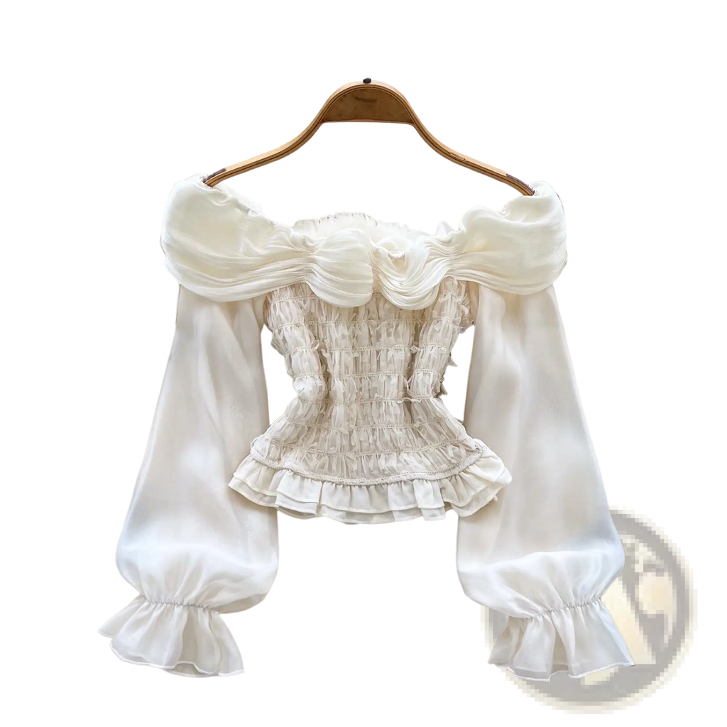 Off-white satin off shoulder blouse with puffy sleeves and ruffled cuffs featuring beaded flower details
