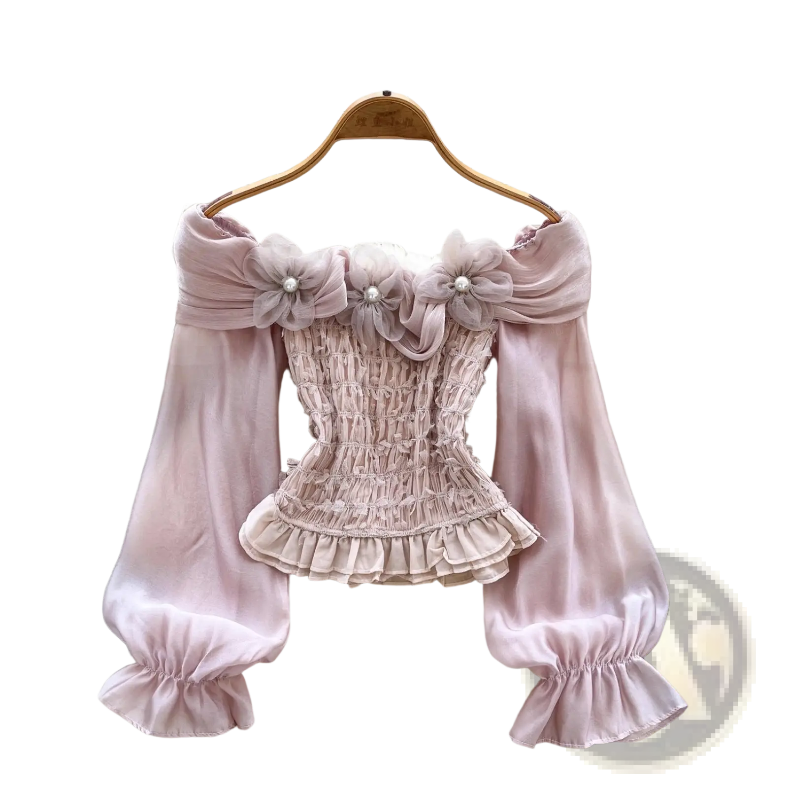 Off shoulder beaded flower flared sleeve blouse in blush pink satin with ruched detailing and pearl-centered fabric flowers