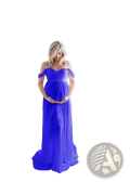 A flowing royal blue chiffon off the shoulder maternity gown with a fitted bodice and long draped skirt for photoshoots