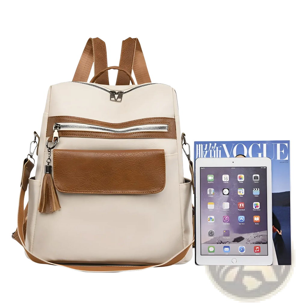 One shoulder cream faux leather backpack with a front zippered pocket tassel detail and silver toned hardware