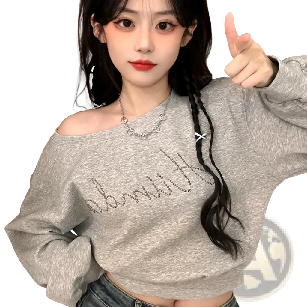 Off shoulder gray sweatshirt featuring rhinestone dammit lettering across the chest for stylish casual wear