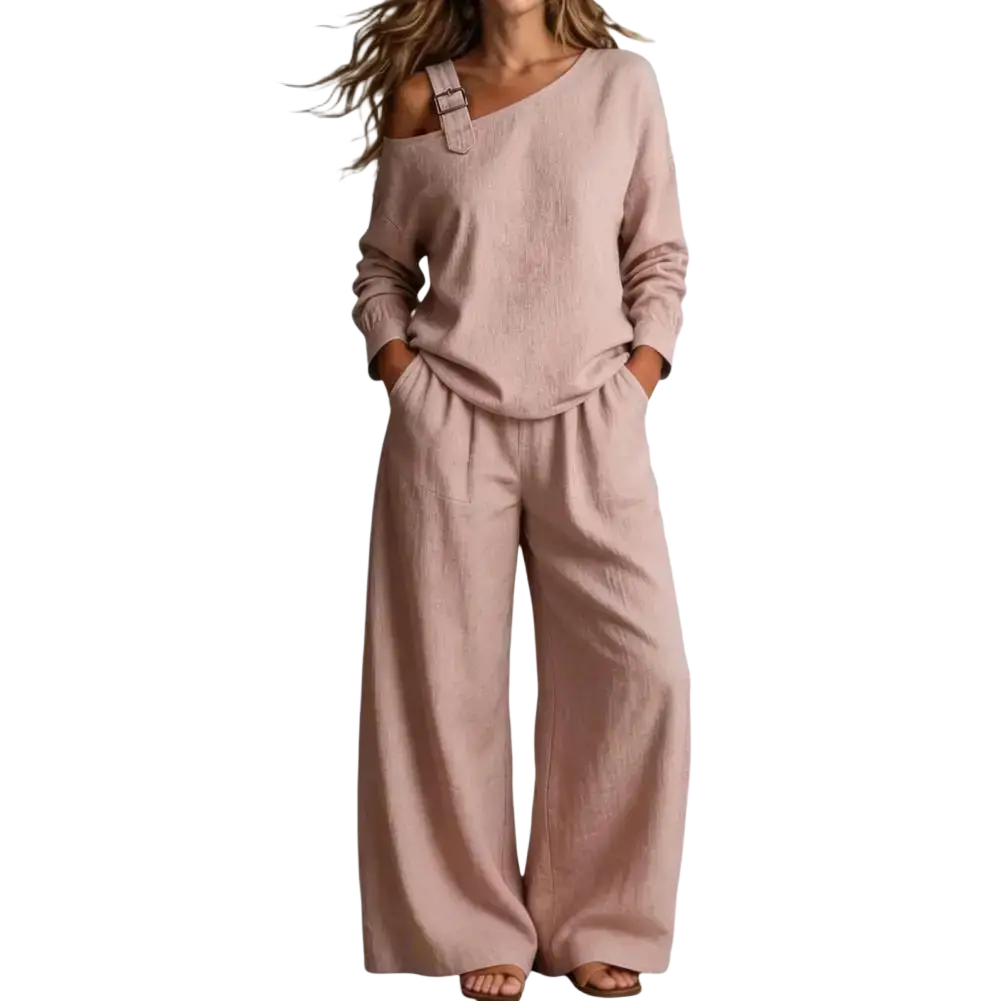 A soft blush pink linen off shoulder long sleeve two piece lounge set with buckle detail and wide-leg pants length