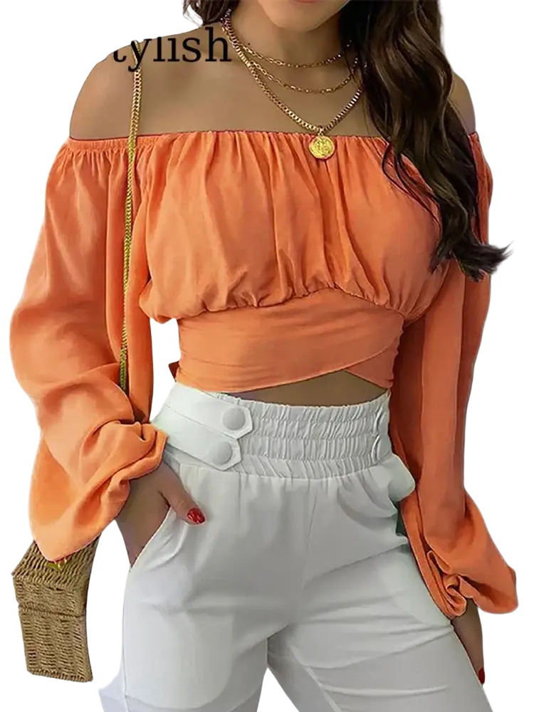 Orange off shoulder printed lantern sleeve crop top with long sleeves and ruched detailing in lightweight fabric