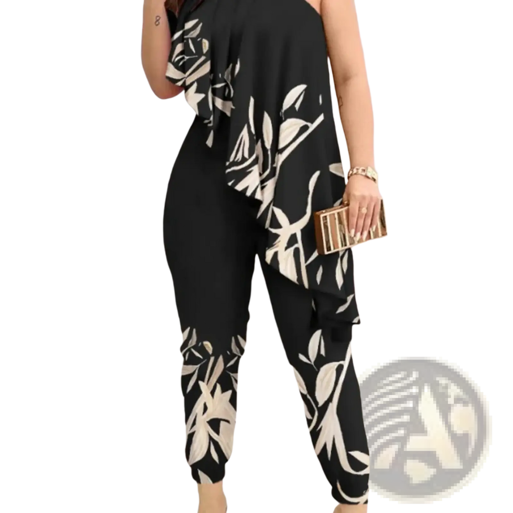Black and white leaf-patterned one-shoulder ruffled jumpsuit with flowing asymmetrical design suitable for elegant occasions
